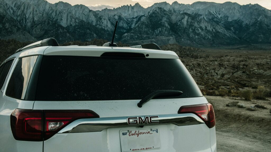 A GMC SUV that is stuck in the Rocky Mountains because is has a "GMC dead battery."